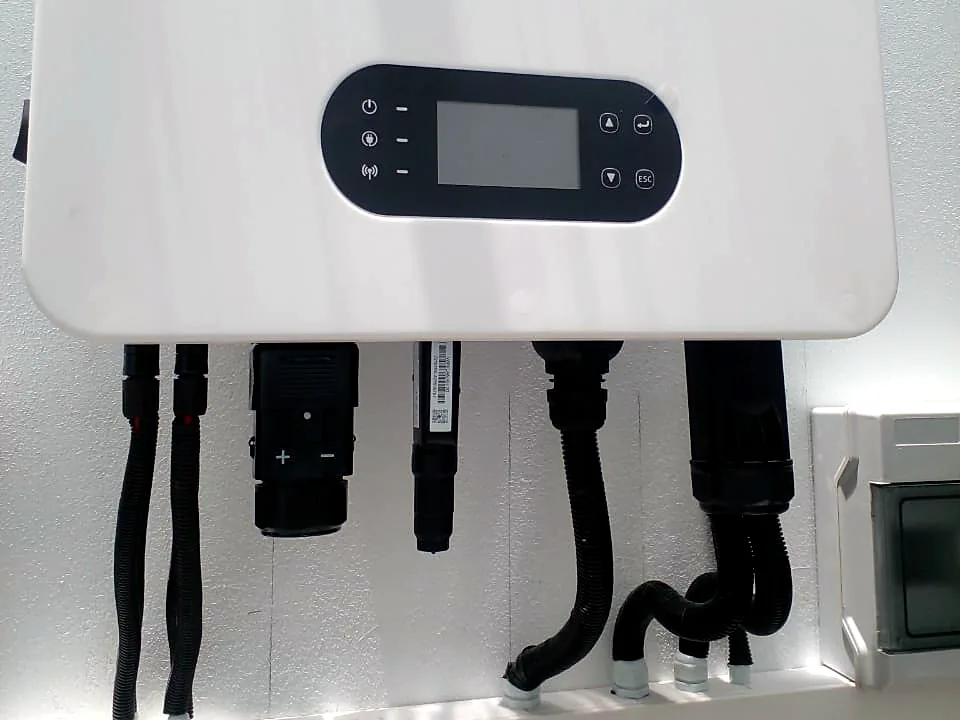 Close-up of GOODWE inverter connectors and display